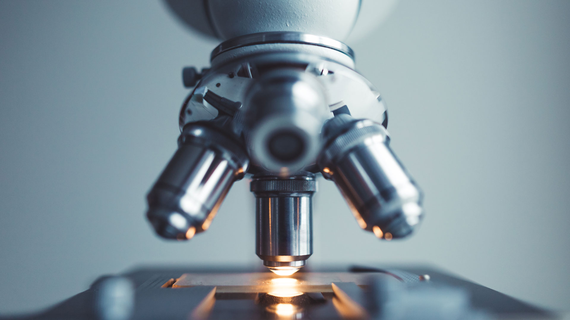 Microscope representing Jabil’s Market Sector Report on healthcare, highlighting advancements in medical technology and supply chain insights.