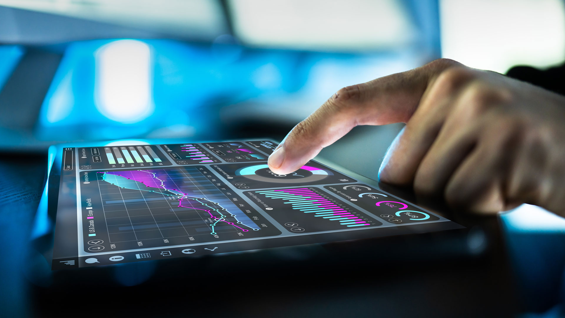 Procurement manager analyzing data on an analytics dashboard, leveraging Jabil’s Procurement Technology Services for smarter decision-making.