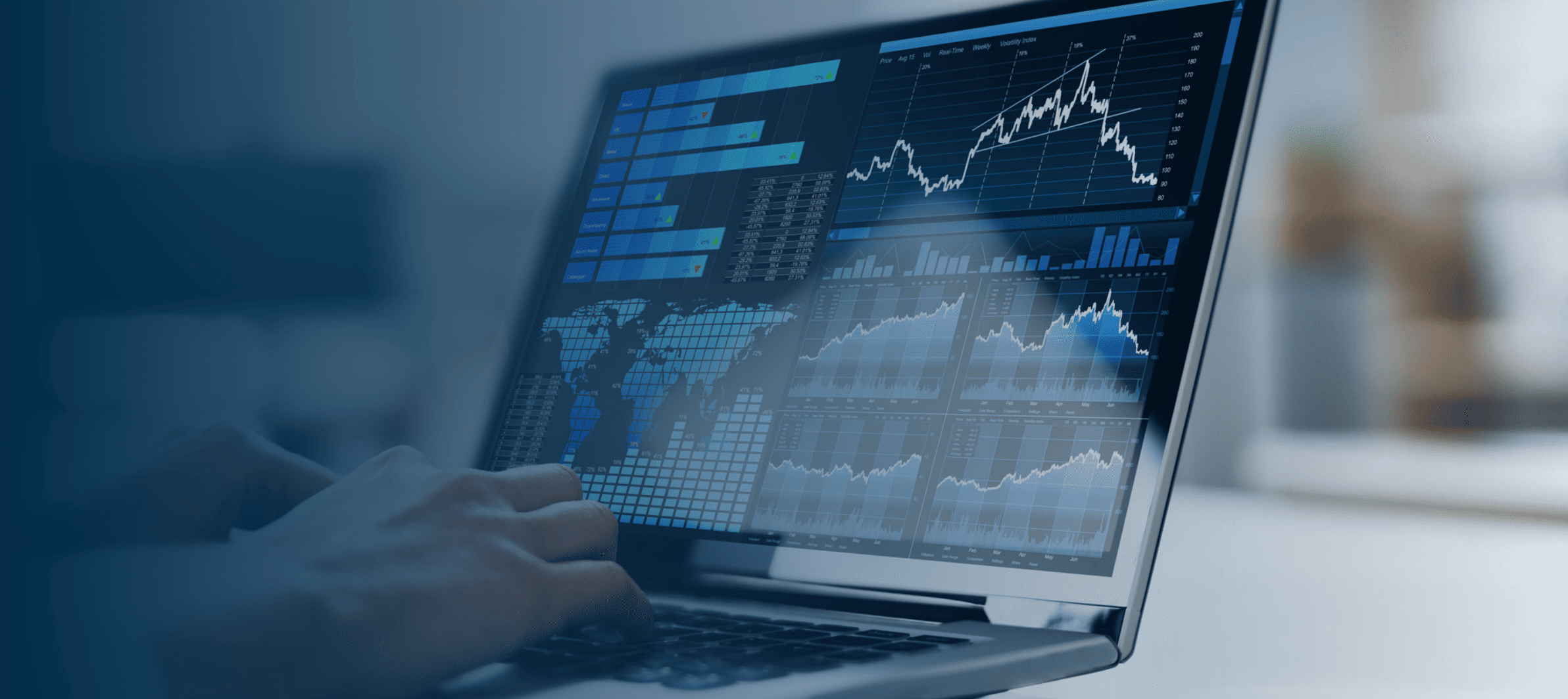 Business leader reviews a data dashboard, utilizing Jabil’s supply chain and procurement solutions for strategic decision-making.
